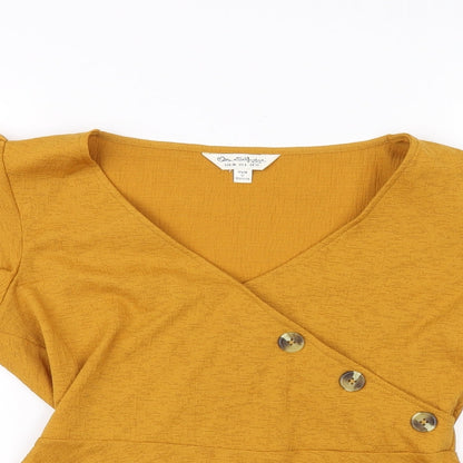 Close-up detail of Miss Selfridge women’s orange basic blouse, size UK 10