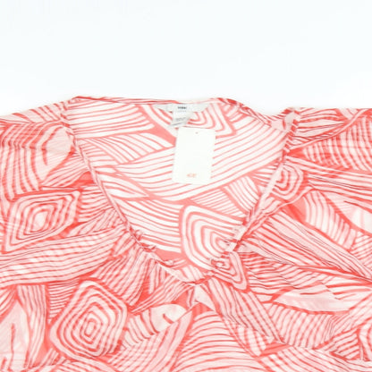 Close-up detail of H&M women’s red geometric basic blouse, size UK 18, - sheer