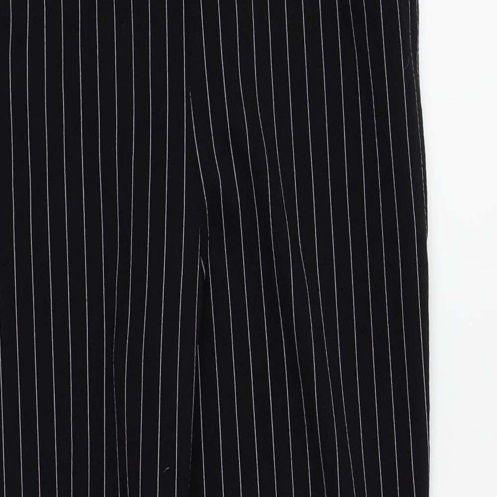 Close-up detail of PRETTYLITTLETHING women’s black striped dress pants trousers, size UK 10