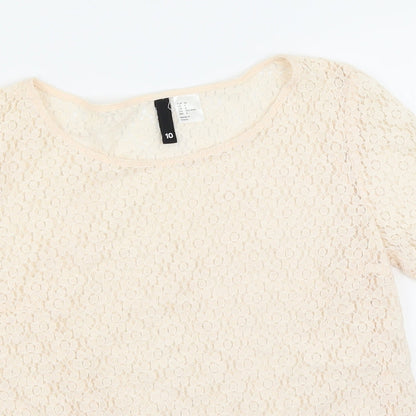 Close-up detail of H&M women’s pink floral basic blouse, size UK 10