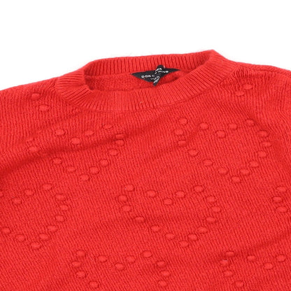 Close-up detail of Dorothy Perkins women’s red polka dot jumper, size UK 12