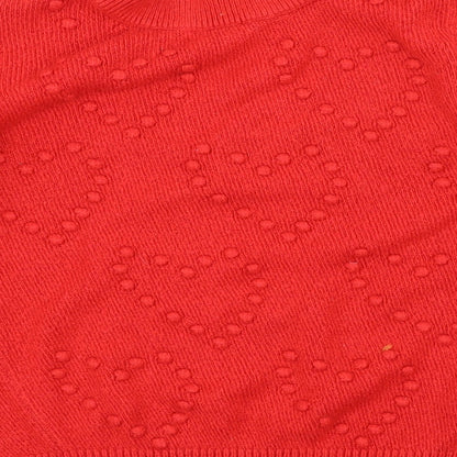 Brand and care label for Dorothy Perkins women’s red polka dot jumper, size UK 12