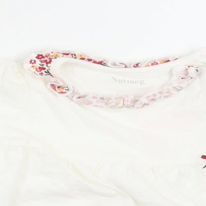 Close-up detail of Nutmeg girls’ white floral basic t-shirt, size 3-6, months