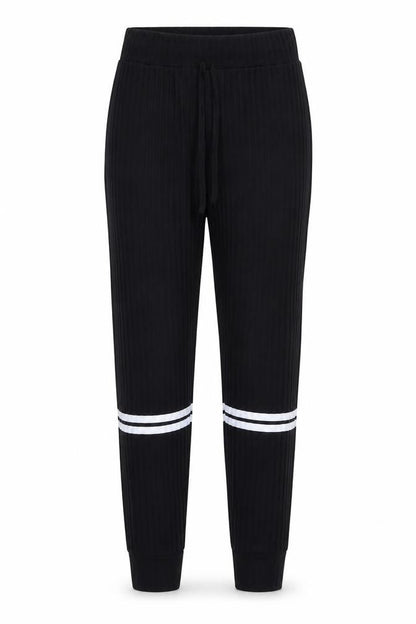 Front view of PRETTYLITTLETHING women’s black trousers, size M, 26-inch leg