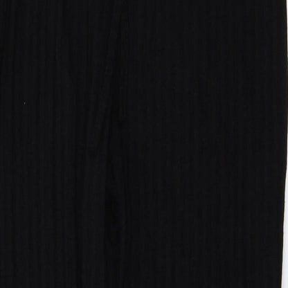 Close-up detail of PRETTYLITTLETHING women’s black trousers, size M, 26-inch leg