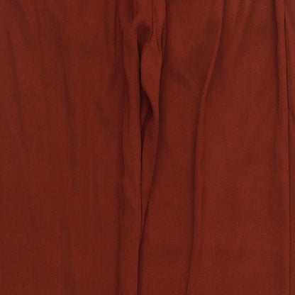 Brand and care label for Atmosphere women’s brown trousers, size UK 10, 28-inch leg