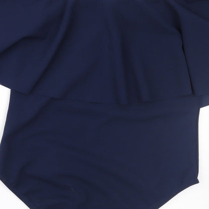 Brand and care label for Missi women’s blue basic blouse, size UK 10