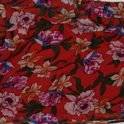 Brand and care label for preworn women’s red floral basic blouse, size UK 10