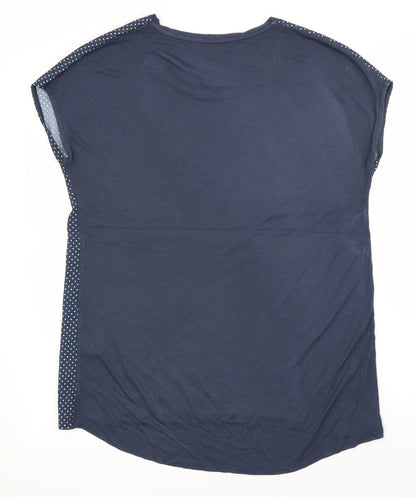 Back view of Montego women’s blue polka dot basic blouse, size M