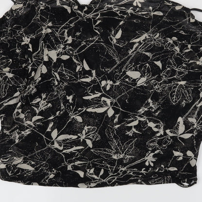 Brand and care label for Mango women’s black floral basic blouse, size M