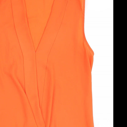 Close-up detail of Paraphrase women’s orange basic blouse, size UK 10