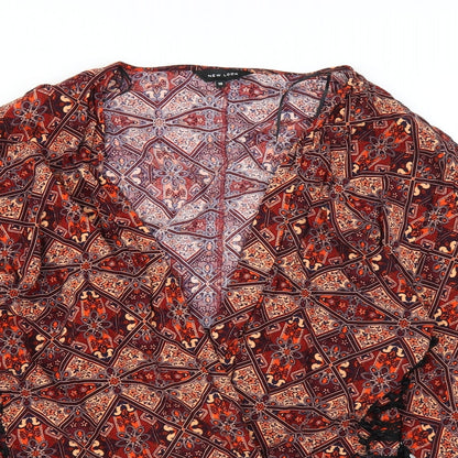 Close-up detail of New Look women’s brown cardigan jumper, size UK 10