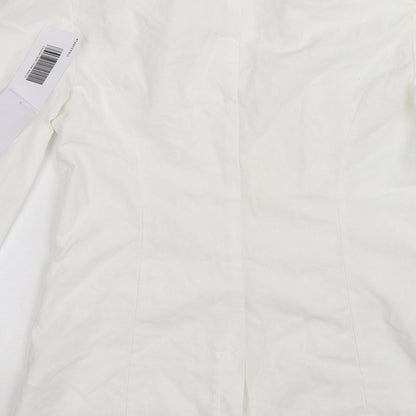 Brand and care label for JustFab women’s white jacket, size XS