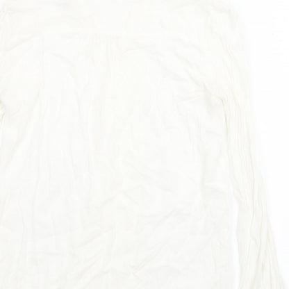 Brand and care label for Promod women’s white basic blouse, size S