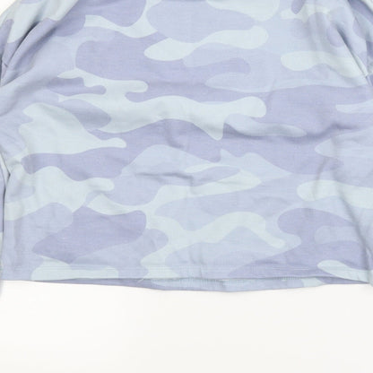 Brand and care label for Primark girls’ blue camouflage pullover hoodie, size 13-14, years
