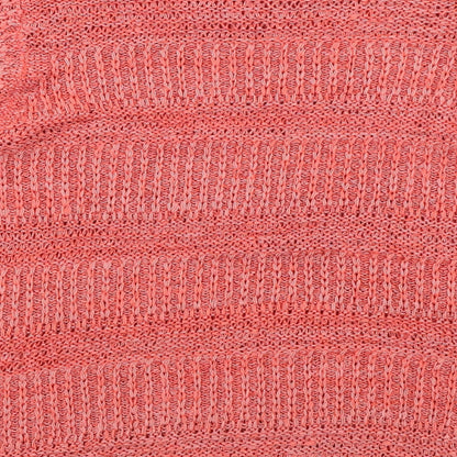 Brand and care label for Classics women’s red jumper, size UK 12
