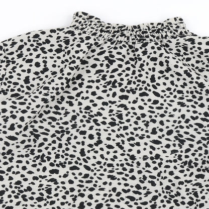 Close-up detail of Preworn women’s grey animal print basic blouse, size UK 8