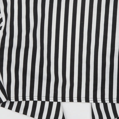 Brand and care label for Buzy women’s black striped jacket, size S
