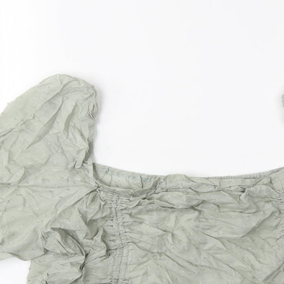 Close-up detail of SHEIN women’s green basic blouse, size 2XL