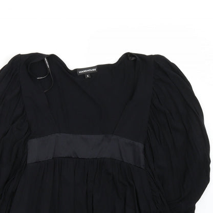Close-up detail of Warehouse women’s black basic t-shirt, size UK 12