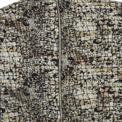 Brand and care label for Blue Vanilla women’s brown animal print pullover sweatshirt, size L