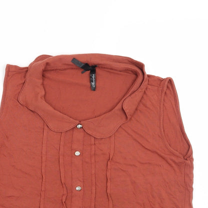 Close-up detail of Atmosphere women’s orange basic blouse, size UK 8