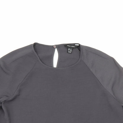 Close-up detail of New Look women’s grey tunic blouse, size UK 12