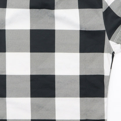 Brand and care label for SHEIN boys’ black plaid basic t-shirt, size XS