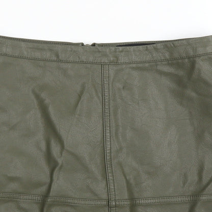 Close-up detail of New Look women’s green a-line skirt, size UK 8