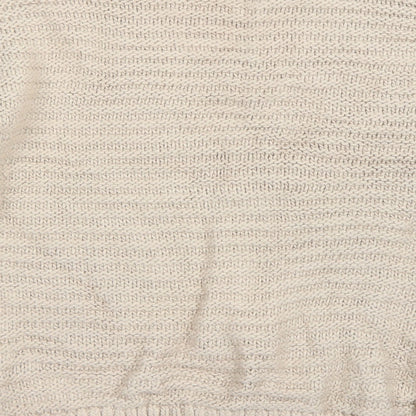 Brand and care label for H&M women’s beige jumper, size XS