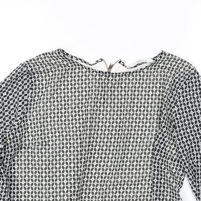 Close-up detail of Mango women’s black polka dot basic blouse, size S