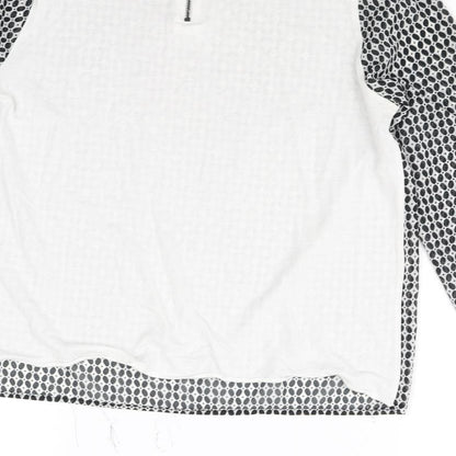 Brand and care label for Mango women’s black polka dot basic blouse, size S
