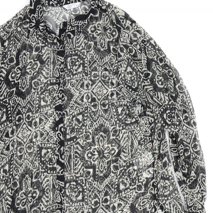 Close-up detail of Papaya women’s black fit & flare, size UK 14