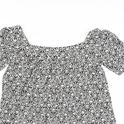 Close-up detail of Matalan women’s black floral basic blouse, size UK 8