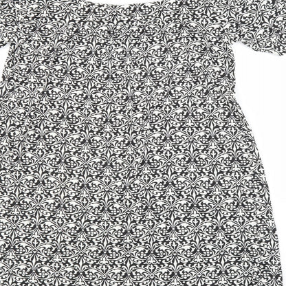 Brand and care label for Matalan women’s black floral basic blouse, size UK 8