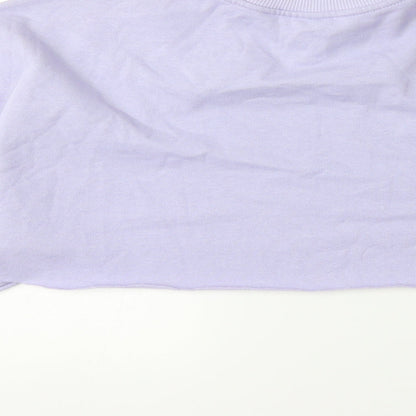 Brand and care label for H&M women’s purple pullover sweatshirt, size S