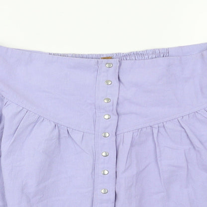 Close-up detail of Three People women’s purple houndstooth flare skirt, size L