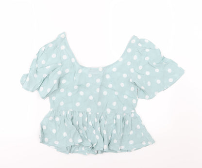 Back view of Primark women’s green polka dot basic blouse, size UK 6