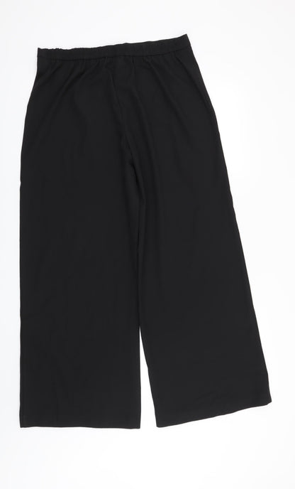 Back view of Nightingales women’s black trousers, size UK 14, 29-inch leg