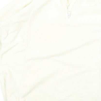 Brand and care label for Berg Outdoor women’s white jumper, size L