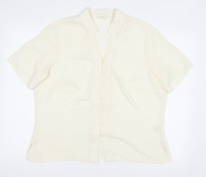 Front view of Marks & Spencer women’s ivory basic button-up, size UK 18
