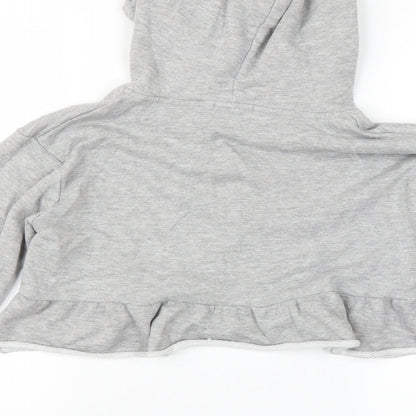 Brand and care label for PRETTYLITTLETHING women’s grey jumper, size UK 10