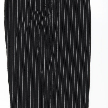 Brand and care label for PRETTYLITTLETHING women’s black trousers, size UK 10, 28-inch leg