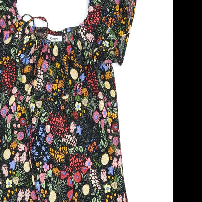 Close-up detail of Only women’s black floral fit & flare, size UK 6