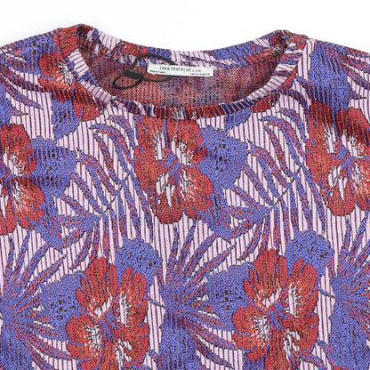 Close-up detail of Zara women’s blue floral basic blouse, size S