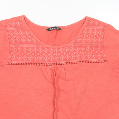 Close-up detail of Bonmarché women’s pink geometric basic t-shirt, size UK 14