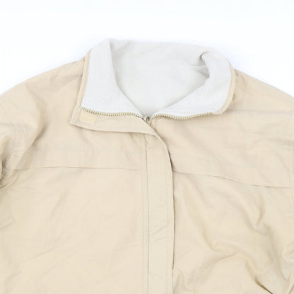 Close-up detail of Marks & Spencer women’s beige jacket, size UK 14, - reversible