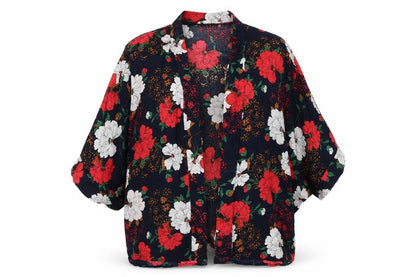Front view of Yumi women’s blue floral wrap jumper, size S