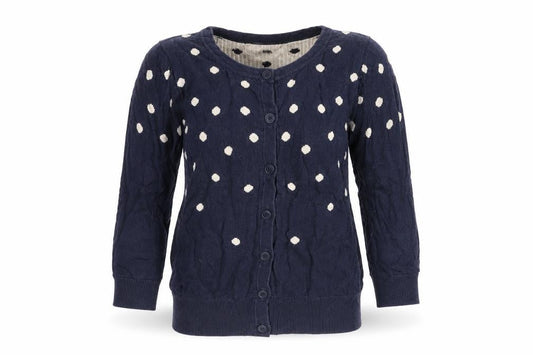 Front view of Warehouse women’s blue polka dot knit cardigan jumper, size UK 8