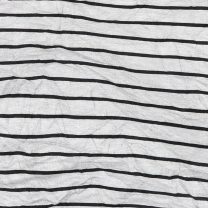 Brand and care label for Dixie women’s grey striped knit jumper, size S